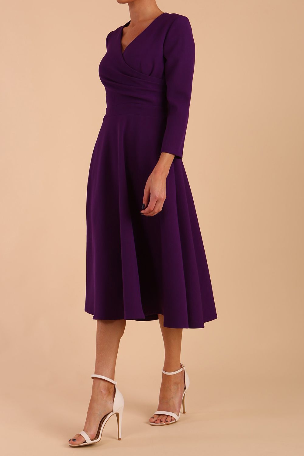 Model wearing diva catwalk Kate 3/4 Length Sleeve A-Line Swing Dress in Deep Purple front side