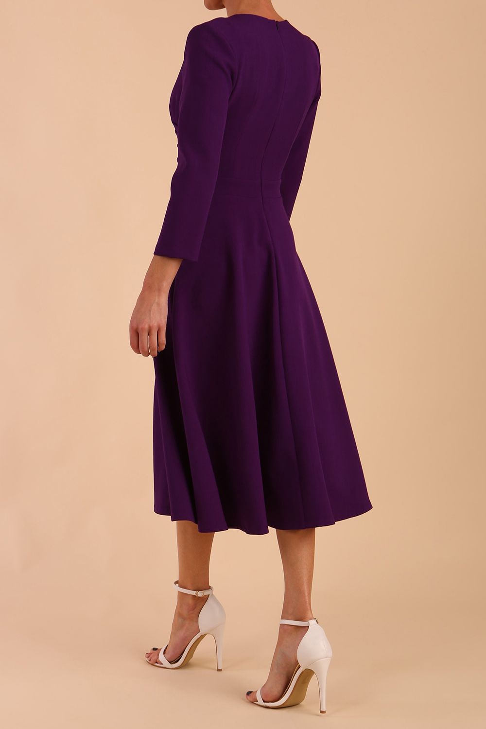 Model wearing diva catwalk Kate 3/4 Length Sleeve A-Line Swing Dress in Deep Purple back
