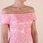 Model wearing diva catwalk Meryl Off Shoulder Floral Jacquard Dress in French Rose Front detail