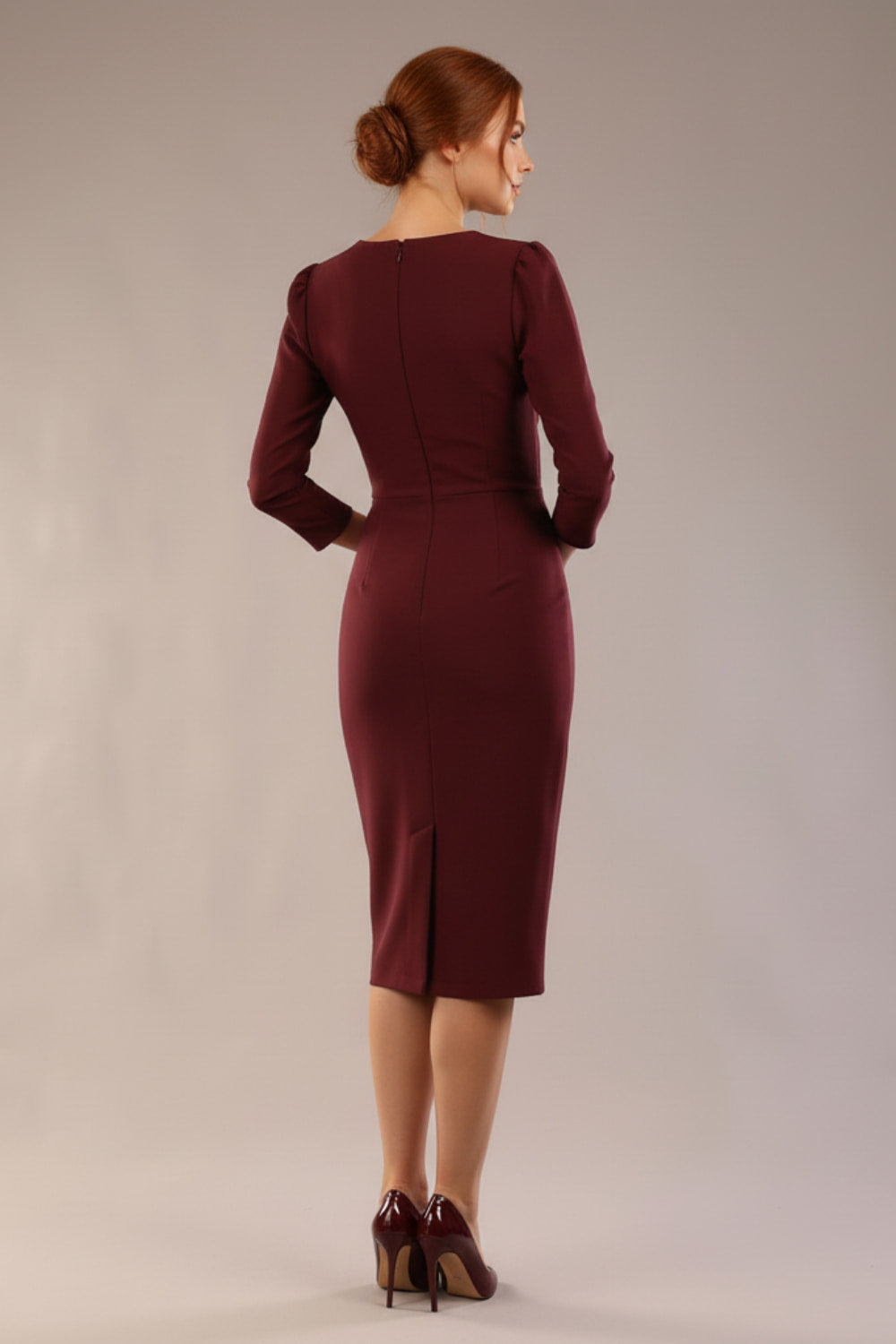 Model is wearing a diva catwalk Cyrus 3/4 Sleeve Pencil skirt Dress in Port Royale front (Port Royale)