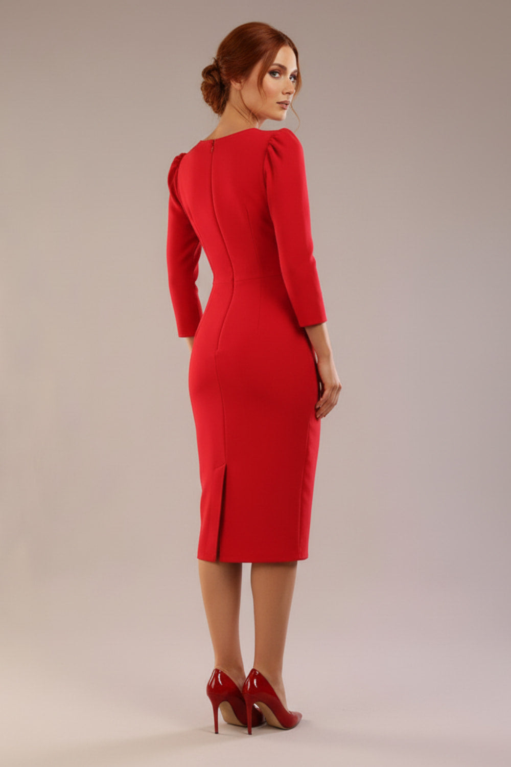 Model is wearing a diva catwalk Cyrus 3/4 Sleeve Pencil skirt Dress in Salsa Red back (Salsa Red)