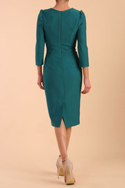 Model wearing diva catwalk Cyrus 3/4 Sleeve Pencil skirt Dress in Pacific Green back