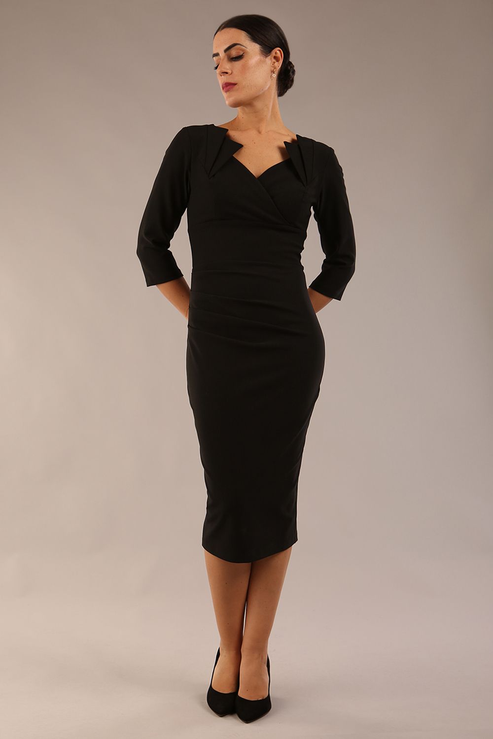 model is wearing a diva catwalk Indira 3/4 Sleeve Knee Length Pencil Dress
collar detail in black colour