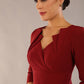 model is wearing a diva catwalk Indira 3/4 Sleeve Knee Length Pencil Dress
collar detail in rio red colour