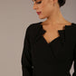 model is wearing a diva catwalk Indira 3/4 Sleeve Knee Length Pencil Dress
collar detail in black colour