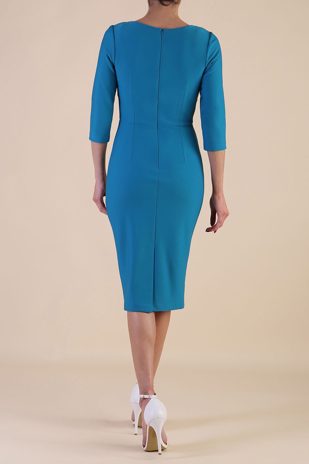 Model wearing diva catwalk Indira 3/4 Sleeve Knee Lenght Pencil Dress in Mosaic Blue back