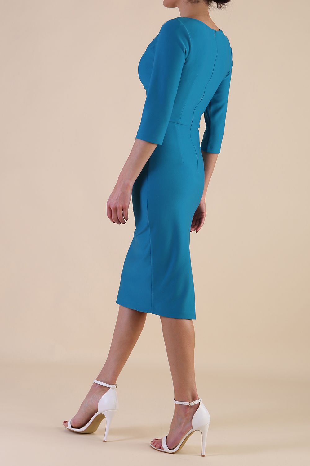 Model wearing diva catwalk Indira 3/4 Sleeve Knee Lenght Pencil Dress in Mosaic Blue side