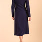Model wearing diva catwalk Heston Long Sleeve Coat Dress in Navy Blue back