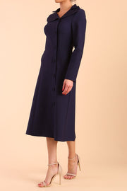 Model wearing diva catwalk Heston Long Sleeve Coat Dress in Navy Blue side