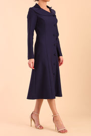 Model wearing diva catwalk Heston Long Sleeve Coat Dress in Navy Blue side
