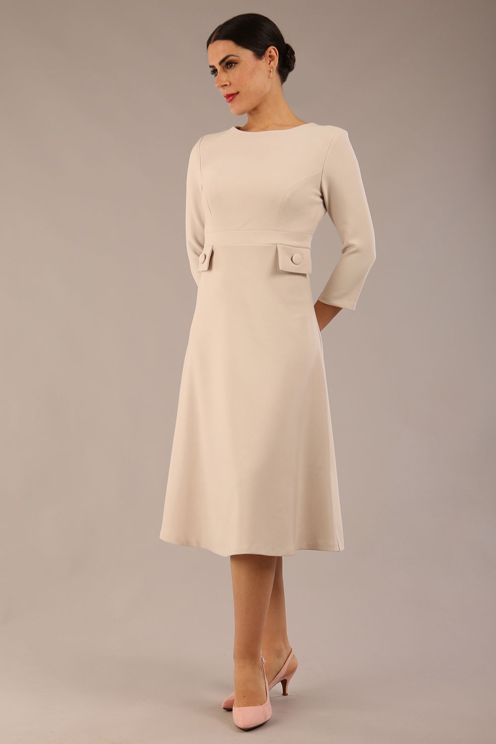 Model wearing diva catwalk Gresham 3/4 Sleeve Knee Length A-Line Dress in Sandy Cream