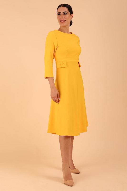 Model wearing diva catwalk Gresham 3/4 Sleeve Knee Length A-Line Dress in Daffodil Yellow