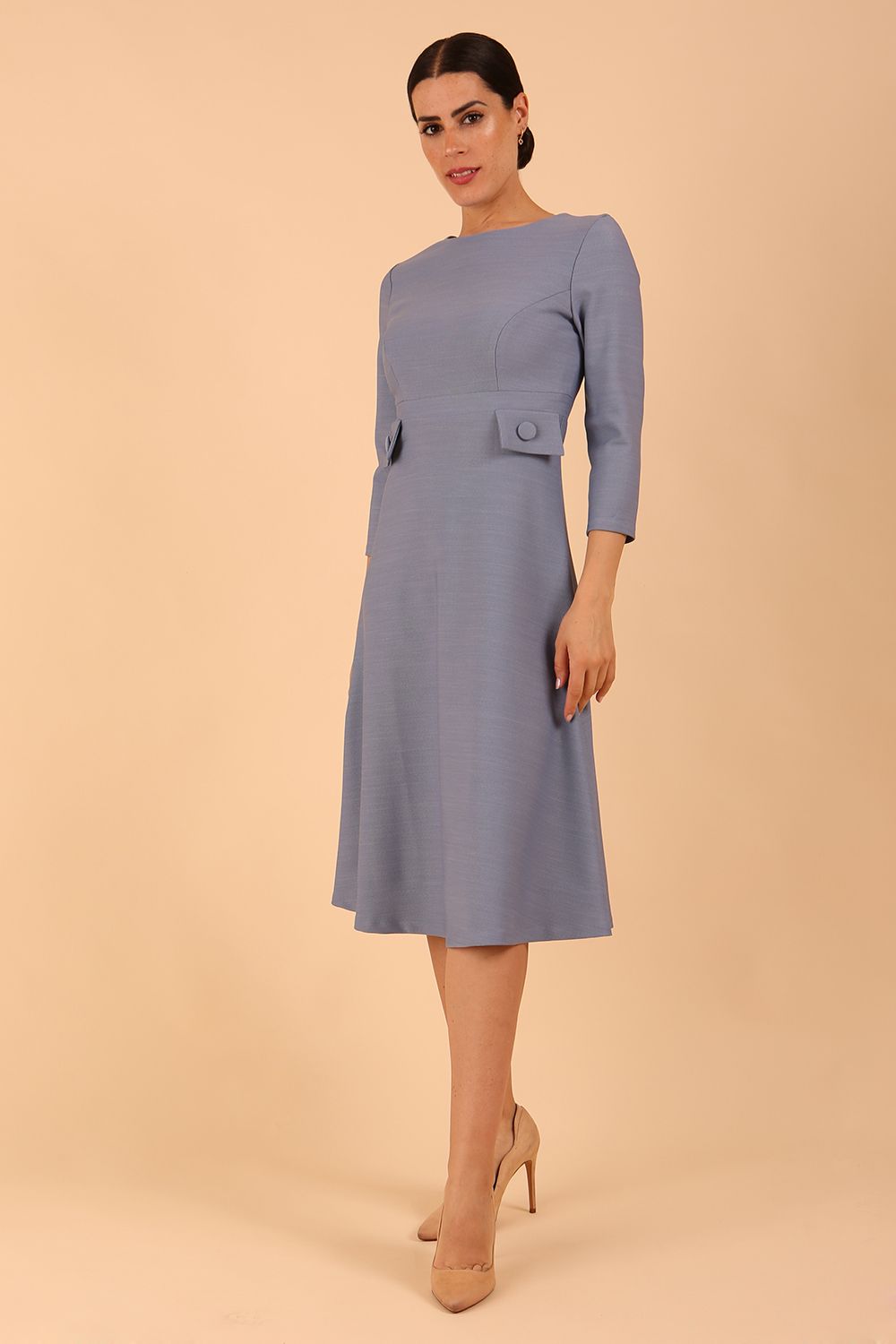 Model wearing diva catwalk Gresham 3/4 Sleeve Knee Length A-Line Dress in Steel Blue side front