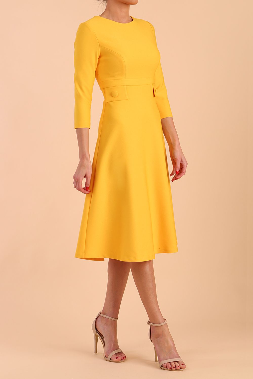 Model wearing diva catwalk Gresham 3/4 Sleeve Knee Length A-Line Dress in Daffodil Yellow side