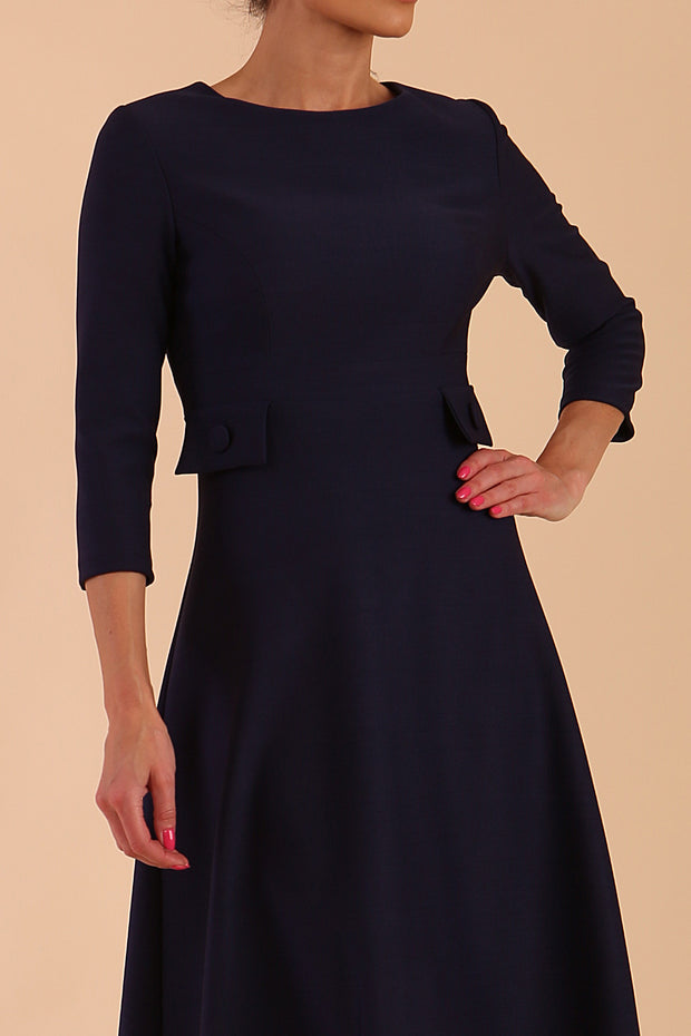 Model wearing diva catwalk Gresham 3/4 Sleeve Knee Length A-Line Dress in Navy Blue front