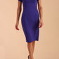 Model wearing a diva catwalk Sheena Short Sleeve with an open split Knee Length Pencil Dress with Diamond Neckline in Indigo Blue colour front