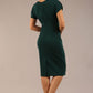 brunette Model wearing a diva catwalk Sheena Short Sleeve with an open split Knee Length Pencil Dress with Diamond Neckline in Forest Green colour back