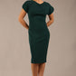 brunette Model wearing a diva catwalk Sheena Short Sleeve with an open split Knee Length Pencil Dress with Diamond Neckline in Forest Green colour front