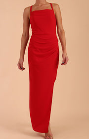 Model wearing Sabrina Maxi Dress with square neckline, sleeveless style, pleating details and side open split, open back in Scarlet Red front 
