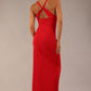 Model wearing Sabrina Maxi Dress with square neckline, sleeveless style, pleating details and side open split, open back in Scarlet Red 