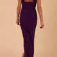 Model wearing Sabrina Maxi Dress with square neckline, sleeveless style, pleating details and side open split, open back in Passion Purple back