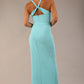 Model wearing Sabrina Maxi Dress with square neckline, sleeveless style, pleating details and side open split, open back in Turquoise