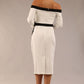 Model wearing a diva catwalk Brittany Off Shoulder Bow detail Pencil Dress with 3/4 sleeves and knee length in Ivory and Black colour