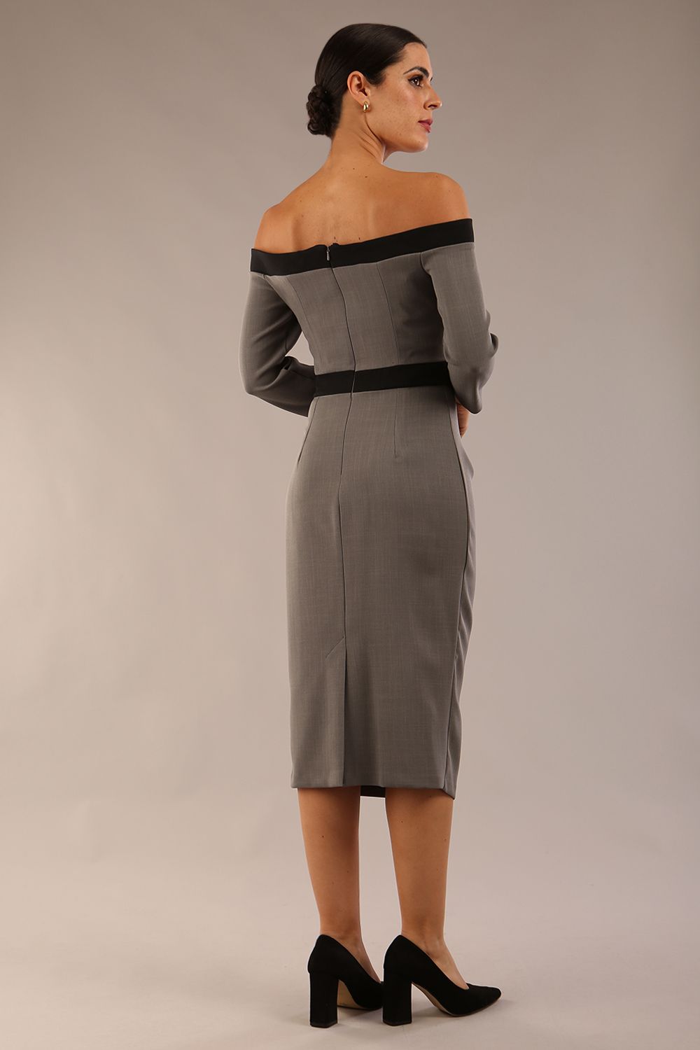 Model wearing a diva catwalk Brittany Off Shoulder Bow detail Pencil Dress with 3/4 sleeves and knee length in Castlerock Grey and Black colour