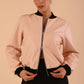 model wearing a diva catwalk Yvonne Faux Leather Jacket with zip and pockets in pink colour front