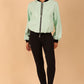 model wearing a diva catwalk Yvonne Faux Leather Jacket with zip and pockets in mint green colour front side