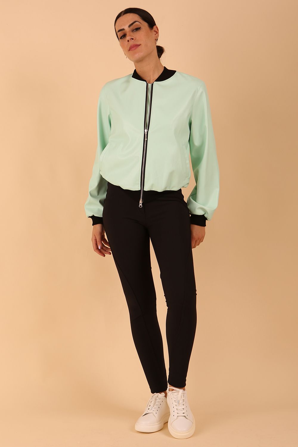 model wearing a diva catwalk Yvonne Faux Leather Jacket with zip and pockets in mint green colour front side