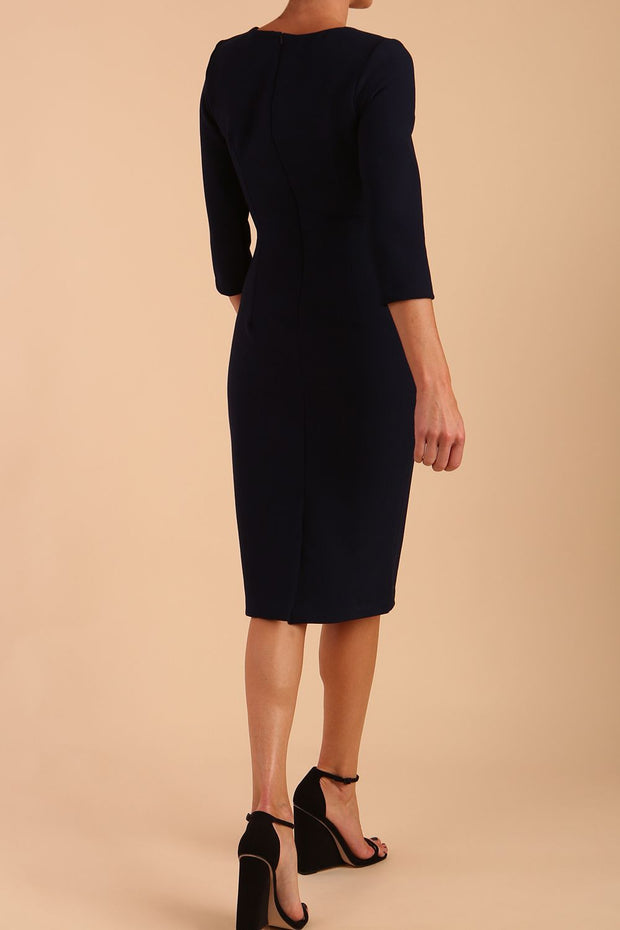 Model wearing DIVA Catwalk Peppard 3/4 Sleeve Pencil Dress in Cameo fabric knee length in navy blue colour back image