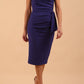 Model wearing diva catwalk Syon Short Sleeved Pencil Dress with tie detail at the waist area in Deep Orient Blue colour front 