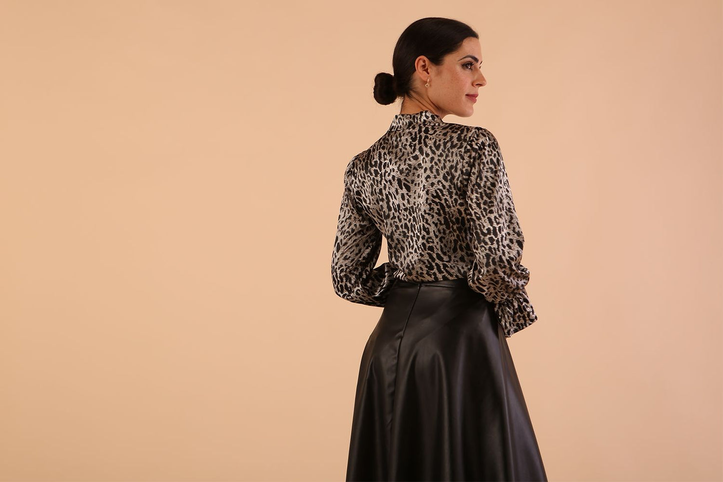 model wearing diva catwalk Zephyra Faux Leather Full Drape Skirt in black colour