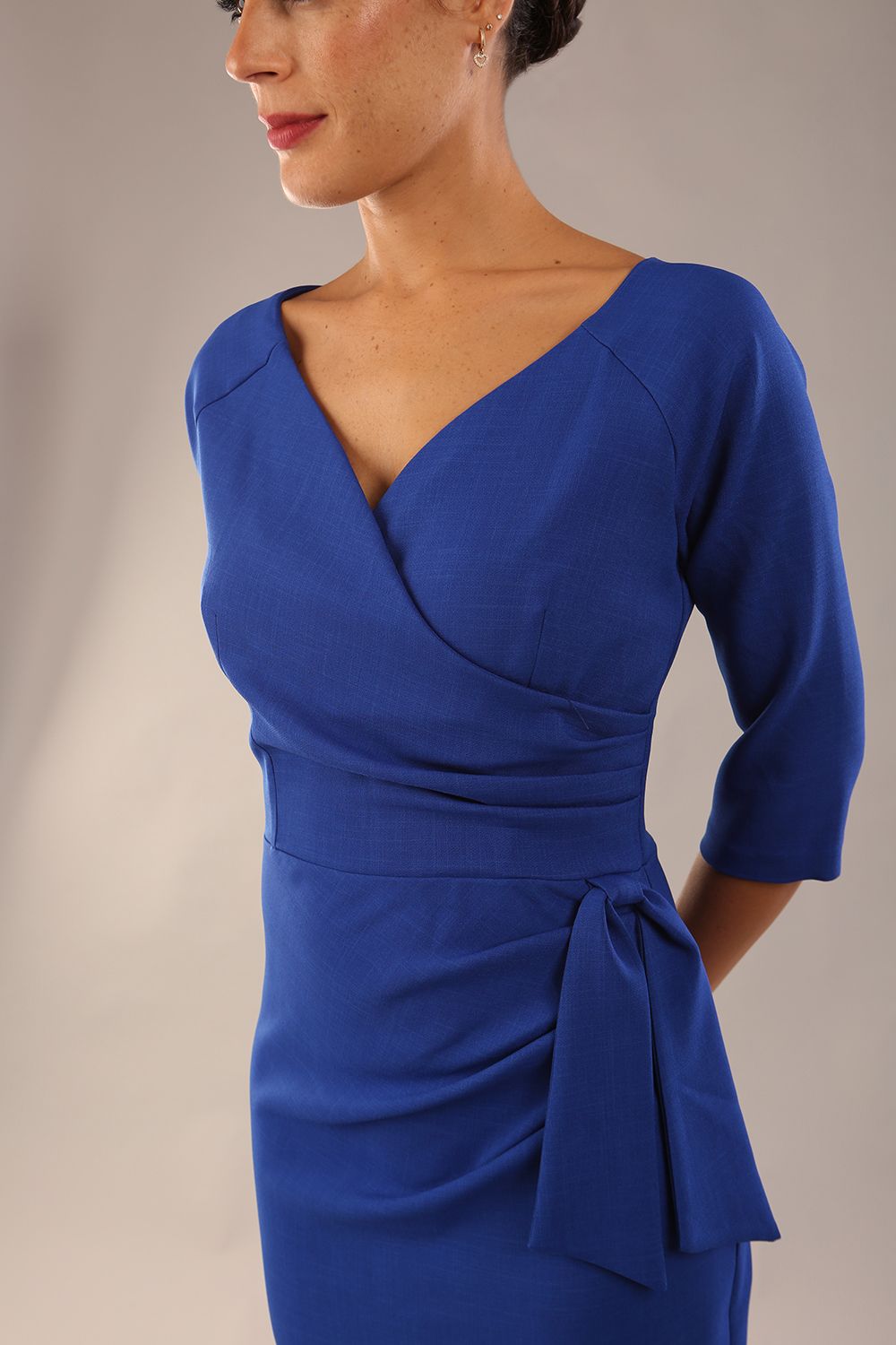 model wearon a diva catwalk Bronwen 3/4 sleeved Tie Pencil Dress in cobalt blue colour