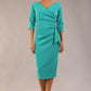 model is wearing a diva catwalk Bronwen 3/4 sleeved Tie Pencil Dress in aqua green colour front