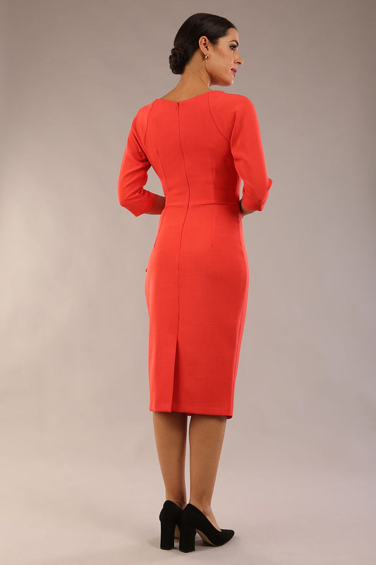 model wearon a diva catwalk Bronwen 3/4 sleeved Tie Pencil Dress in grenadine orange colour back