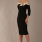 Model is wearing a diva catwalk Rosalind Off Shoulder Bow Detail Pencil Dress 3/4 sleeve in Black/Champagne contrast front image (Black / Champagne Contrast)