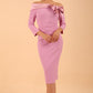 Model wearing a Rosalind Off Shoulder Bow Detail Pencil Dress 3/4 sleeve in Dawn Pink colour