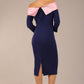 brunette Model is wearing a diva catwalk Rosalind Off Shoulder Bow Detail Pencil Dress 3/4 sleeve in Navy Blue/Lilac Contrast contrast back image