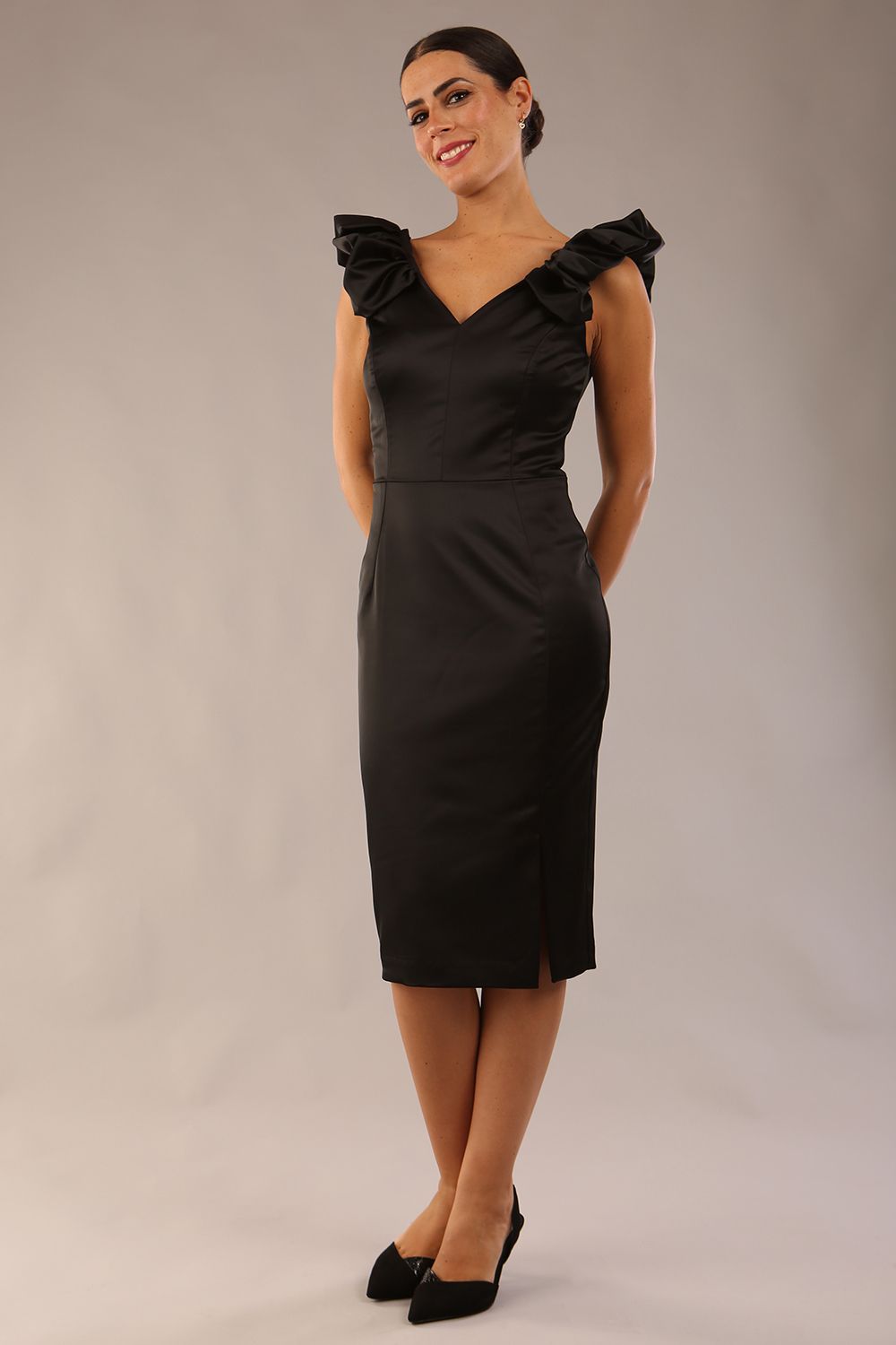 model is wearing a diva catwalk Prudence Satin Pencil Dress sleeveless and knee length with front vent in black colour