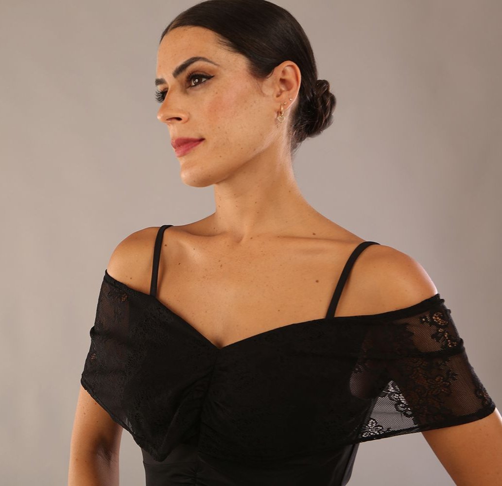 model wearing a diva catwalk Vivienne Off Shoulder Dress with stripes with sweetheart neckline lace short sleeve design and asymmetric bottom line in black 