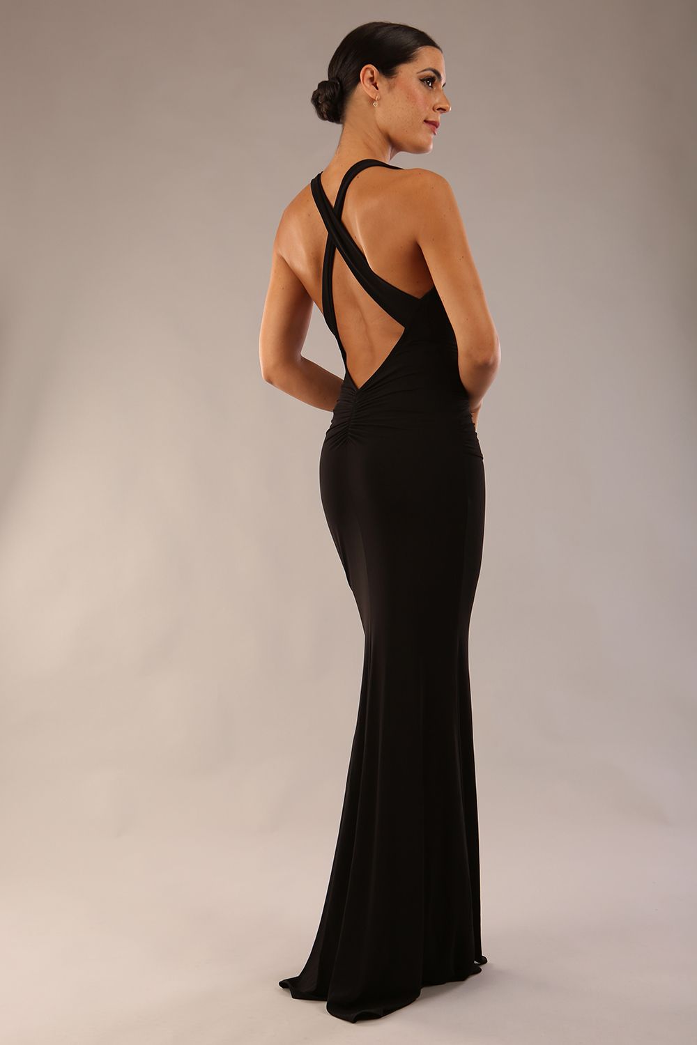 model wearing an elegant and sexy diva catwalk Lillian Slinky Stretch Full Length Dress open back with stripes and maxi length with V neckline in black