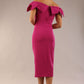 model is wearing a diva catwalk Strand Off-Shoulder Bow Tie Dress midi length and pleated skirt in magenta haze colour