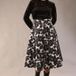 model is wearing a Gwendolyn Midi Length Skirt in Floral Print satin black and white a-line midi length skirt