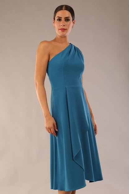 Model wearing a diva catwalk Portia One Shoulder A-line Dress midi length sleeveless style in Teal Colour
