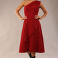 Model wearing a diva catwalk Portia One Shoulder A-line Dress midi length sleeveless style in Rosewood Red Colour