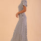 model wearing a divacatwalk Selene Stripes Swing Dress with stripes in navy blue colour side image