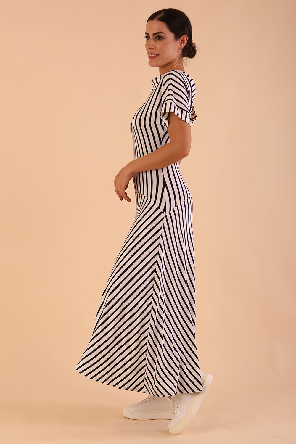 model wearing a divacatwalk Selene Stripes Swing Dress with stripes in navy blue colour side image