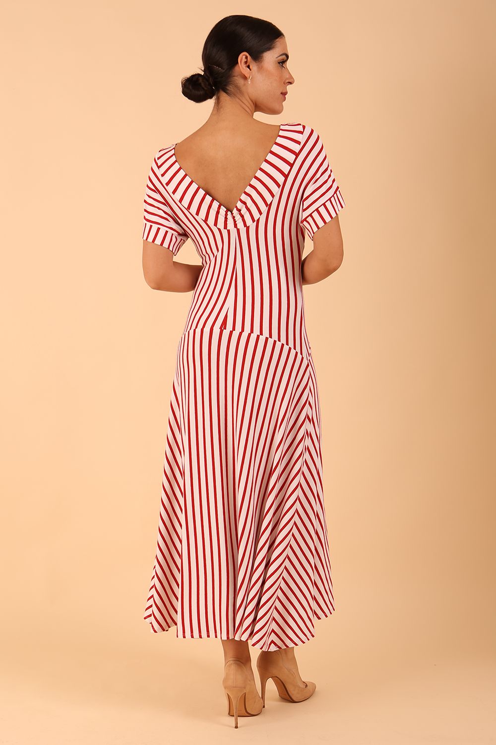 model wearing a divacatwalk Selene Stripes Swing Dress with stripes in red colour back image